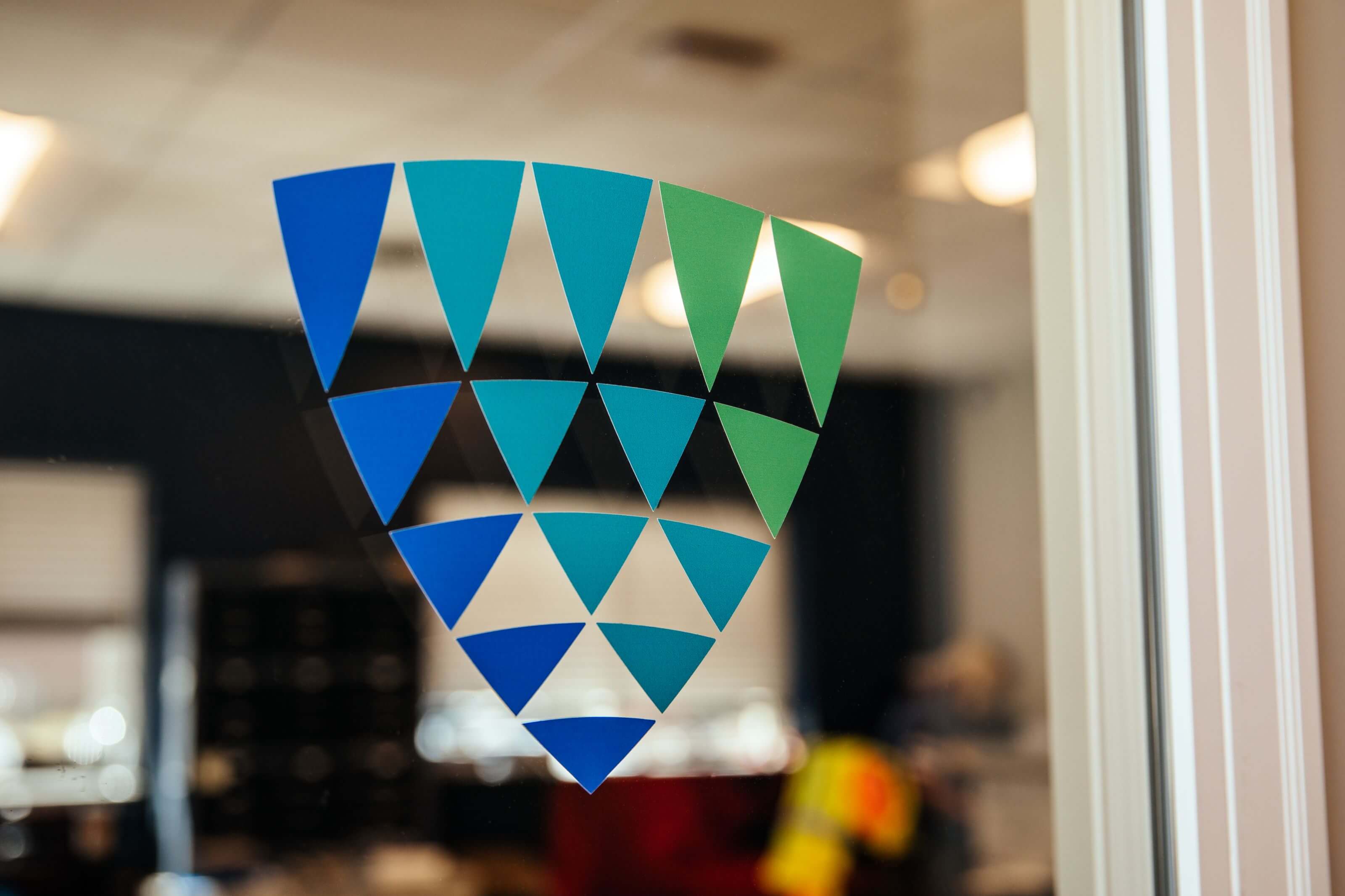 Lineage Logo on glass wall.