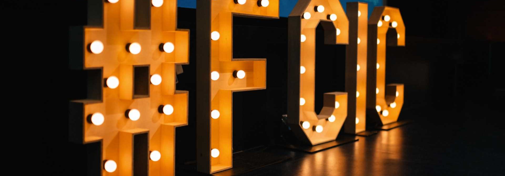 large lighted letters with a hashtag
