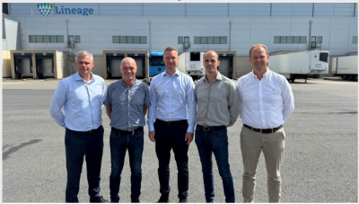 Danpo and Lineage leadership teams outside the Vejle cold storage facility in Denmark.