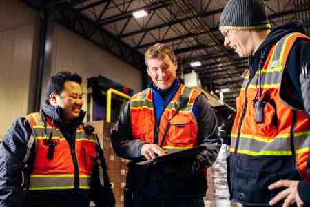 Lineage team members work in a warehouse