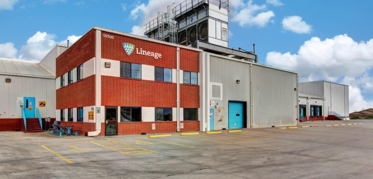 Exterior of the Lineage cold storage facility in El Paso, Texas, showing the brick office building, warehouse bays and paved lot under a clear sky.