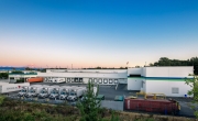 Exterior photo of Lineage's Tacoma facility at dusk with Mt. Rainier in the background
