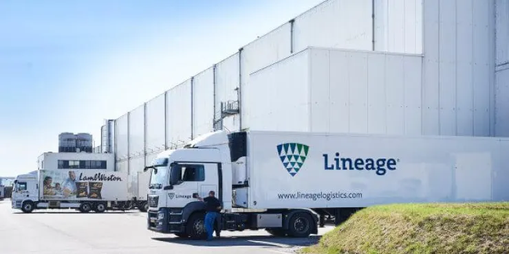 Lineage refrigerated truck at the Bergen op Zoom cold storage facility in the Netherlands, highlighting integrated transportation and logistics capabilities.