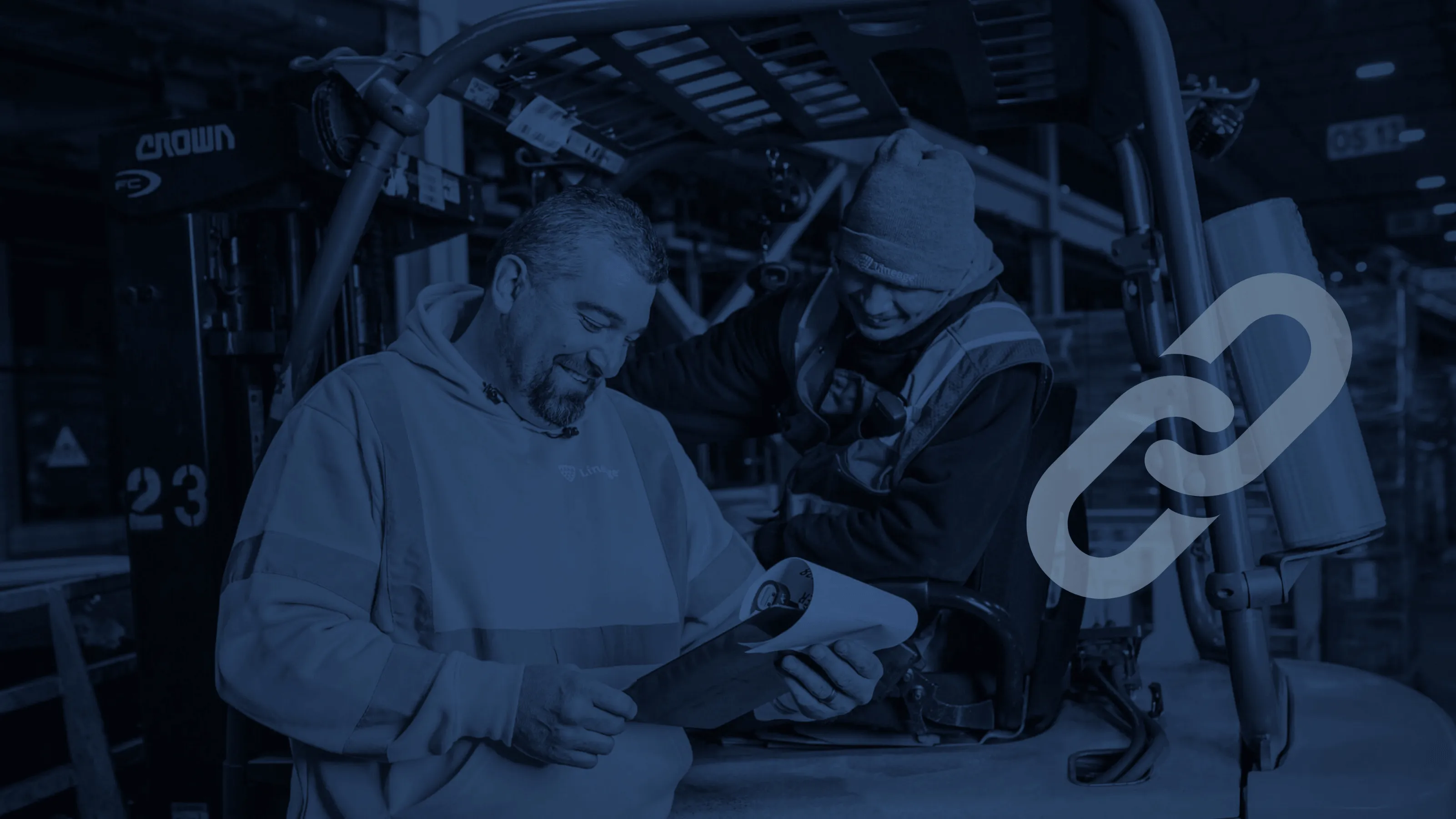 Ethics and compliance picture of two team members wearing an orange vest