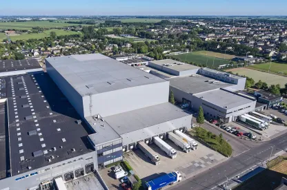 Lineage automated cold storage warehouse in Waalwijk, Netherlands with case picking and onsite processing capabilities.