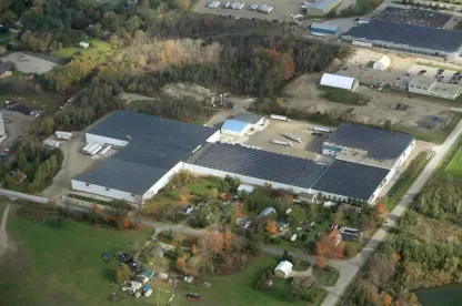 Exterior view of Ingersoll cold storage warehouse with Lineage logo