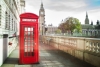 Iconic red phone box in front of Big Ben in London